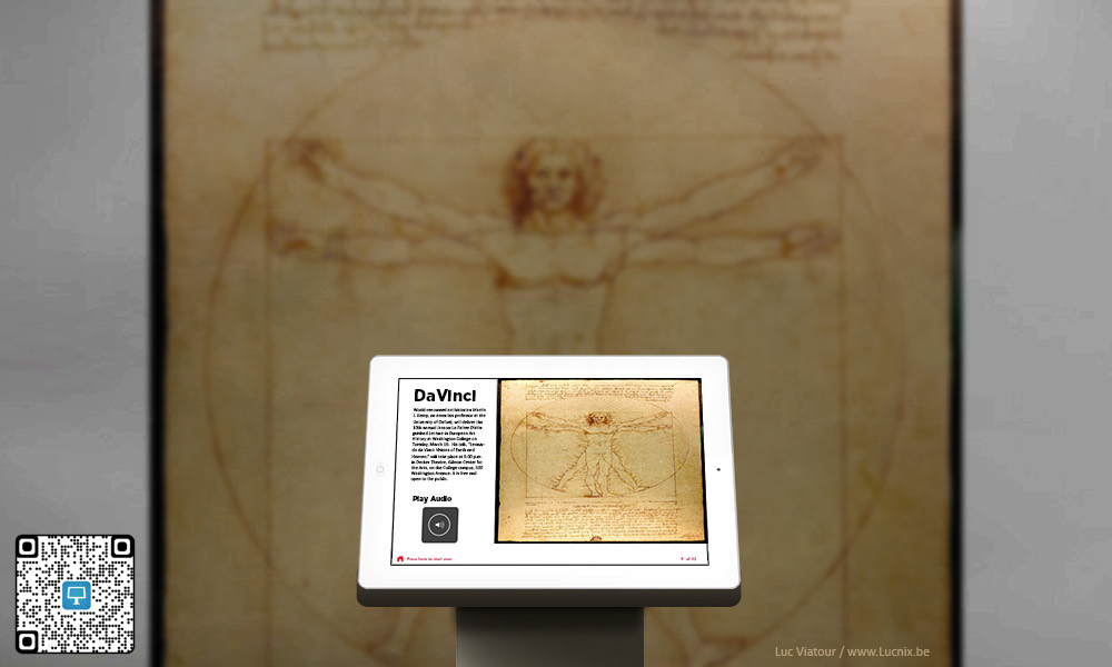 iPad kiosk in front of a da Vinci Vitruvian Man exhibit offering interactive exhibit information and audio narration