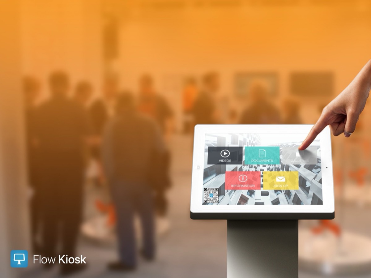 iPad kiosk on a floor stand at a trade show running an interactive menu with videos, documents, galleries and sign-up